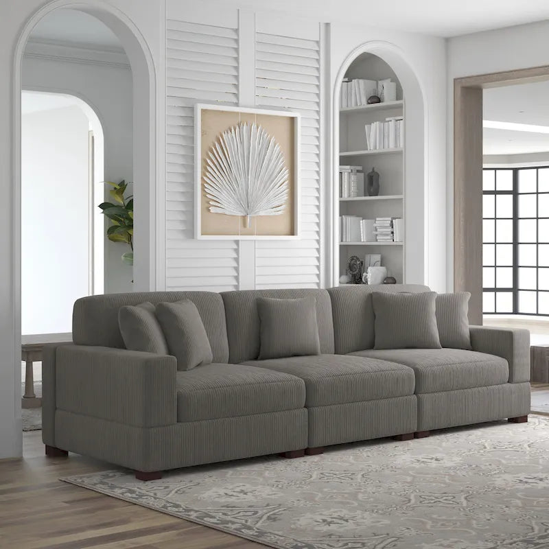 Sofá seccional modular de pana con cojines