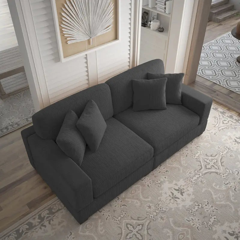 Sofá seccional modular de pana con cojines