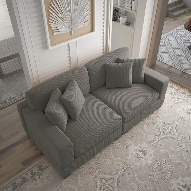 Sofá seccional modular de pana con cojines