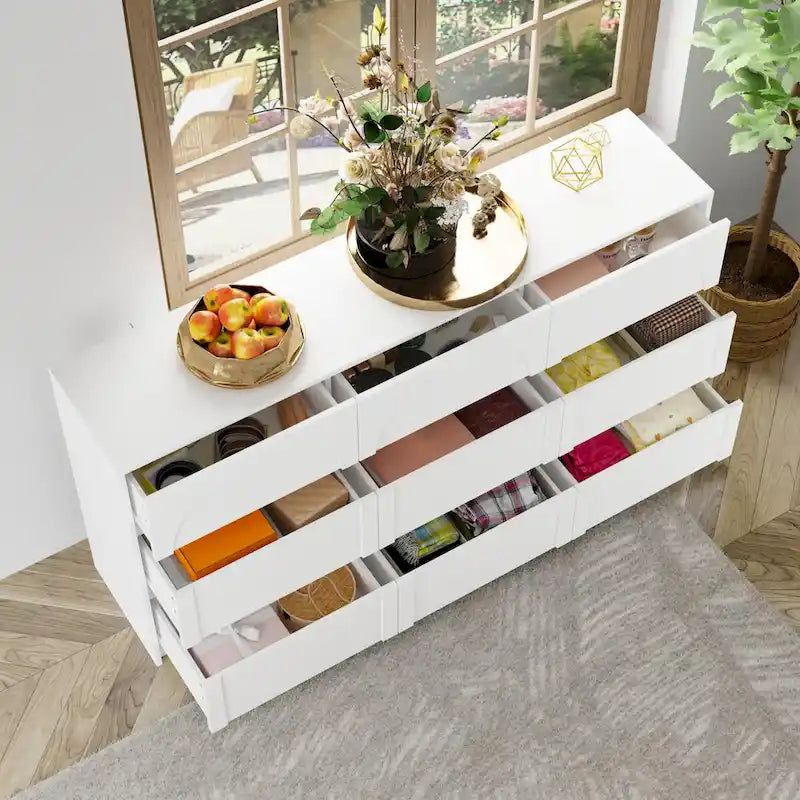 Cómoda blanca de 9 cajones con diseño elegante y sistema antivuelco